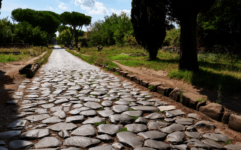 Appian Way's cobblestones in Rome during the summer