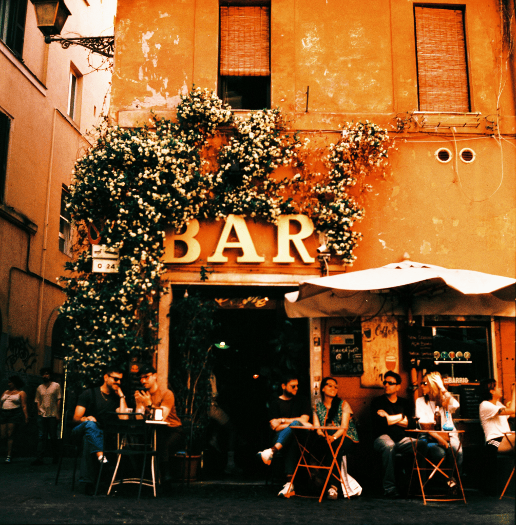 Cozy bar in the evening in Rome, Italy.