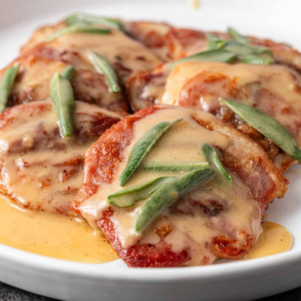 Italian Saltimbocca alla Romana on a white plate.